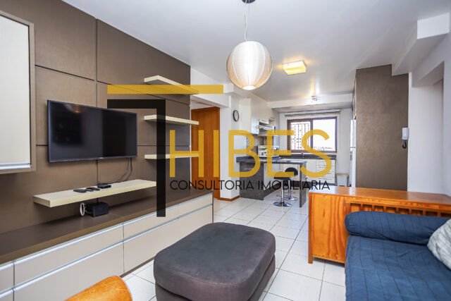 Apartamento centro, 2 dormitórios, mobiliado, 64 m² privativos, 2 vagas de garagem.